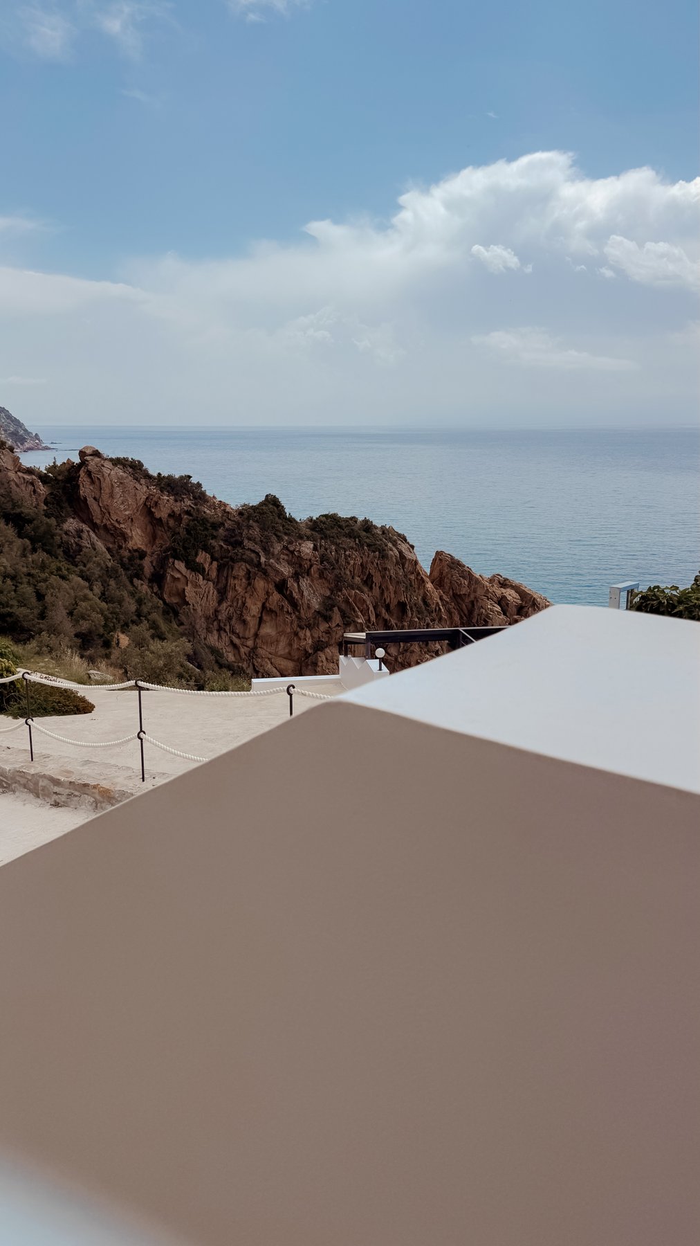 Cliffside architecture above the coastline