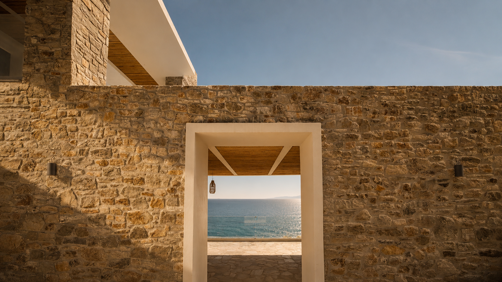 Architectural transition framing the sea beyond the Nyx terrace threshold