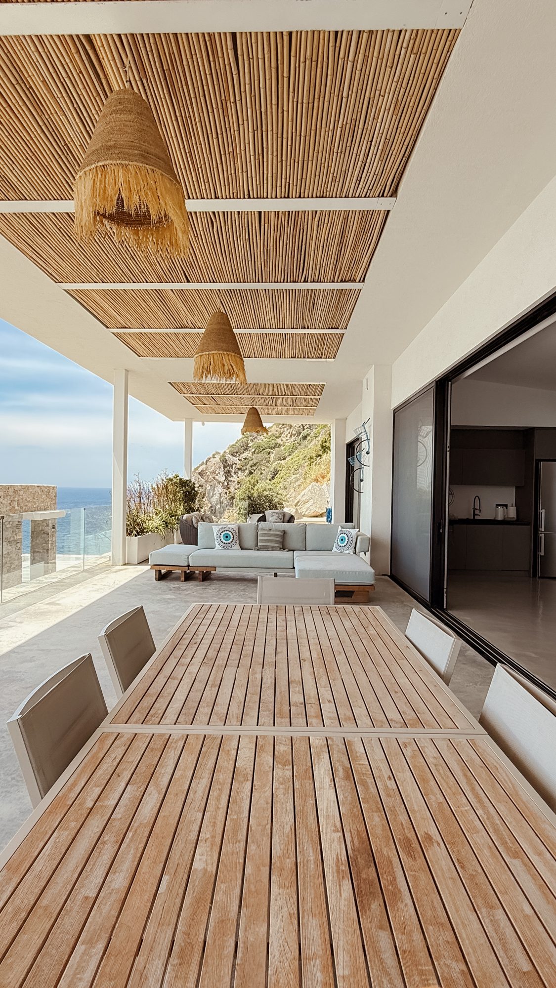 Bamboo-shaded deck over the water